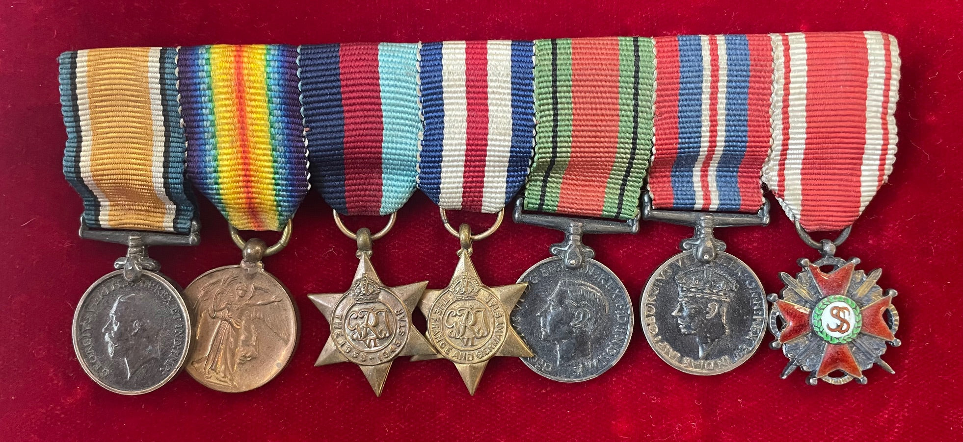 The mounted group of seven miniature dress medals worn by Major F. T. Swann, Intelligence Corps